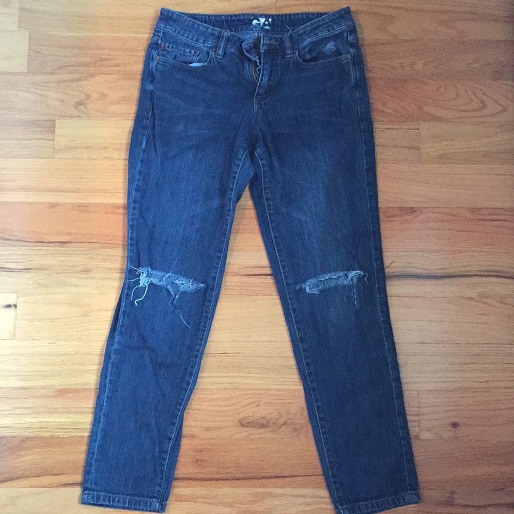 Garage ripped blue jeans